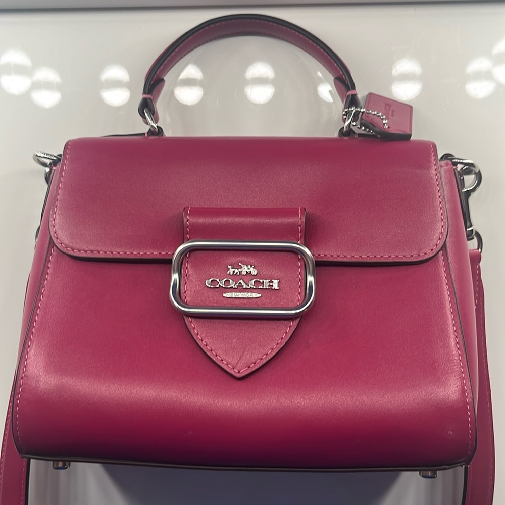 Dark pink top handle Coach purse
